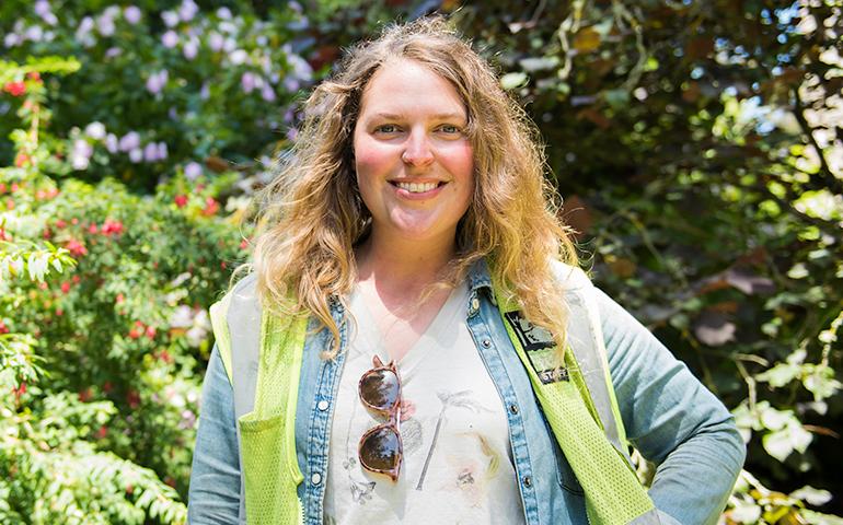 Photo of female gardener standing in Golden Gate Park.